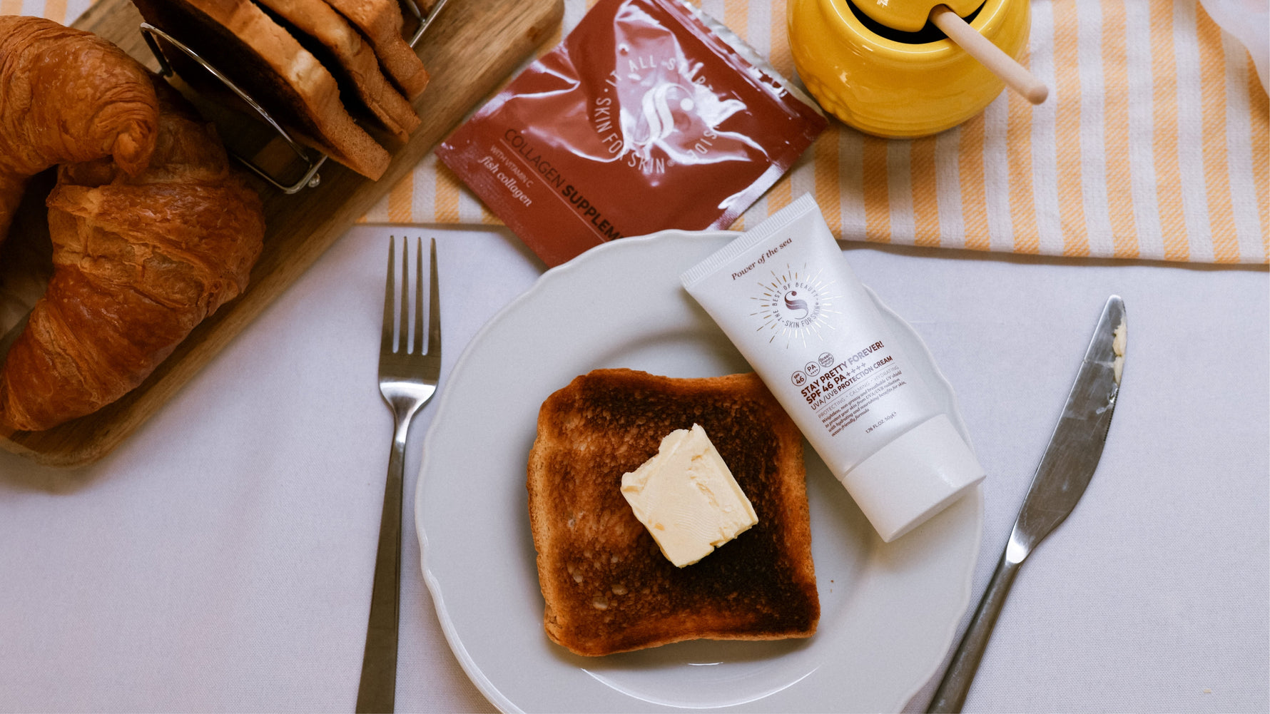 verbrand toastbrood met een tube spf zonnebrand